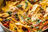Crispy Pancetta Ravioli: Sun-Kissed Tomato & Spinach Delight
