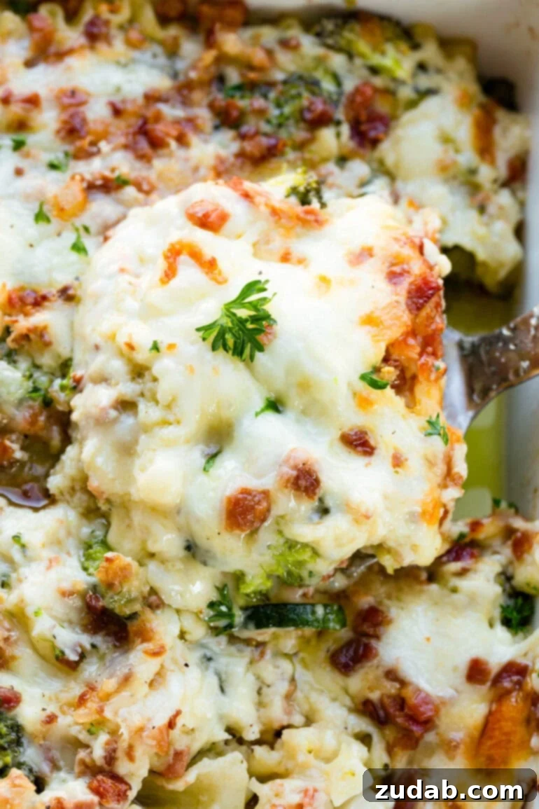 Creamy Vegetable Lasagna with Crispy Pancetta 2 A golden-baked serving of vegetable white lasagna with pancetta being lifted from a pan, showcasing its irresistible layers and creamy texture.
