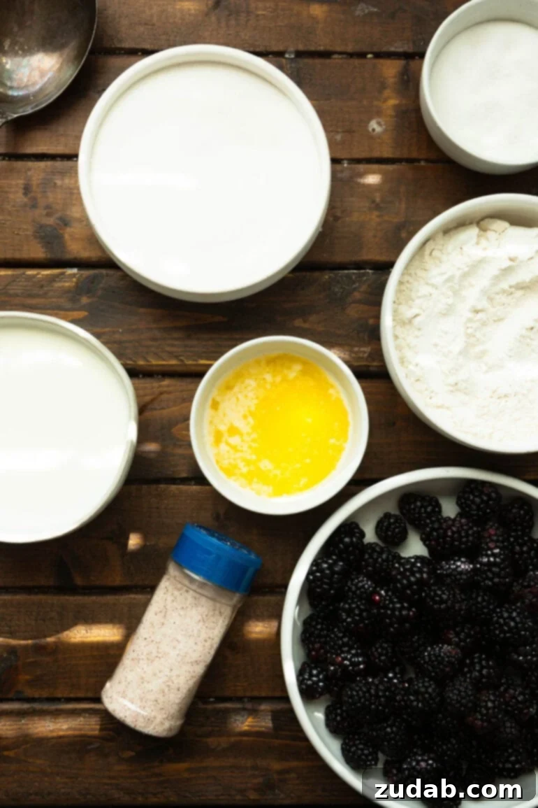 Timeless Blackberry Cobbler Bliss 4 Individual bowls showcasing the six simple ingredients required for blackberry cobbler: sugar, self-rising flour, salt, milk, butter, and fresh blackberries.