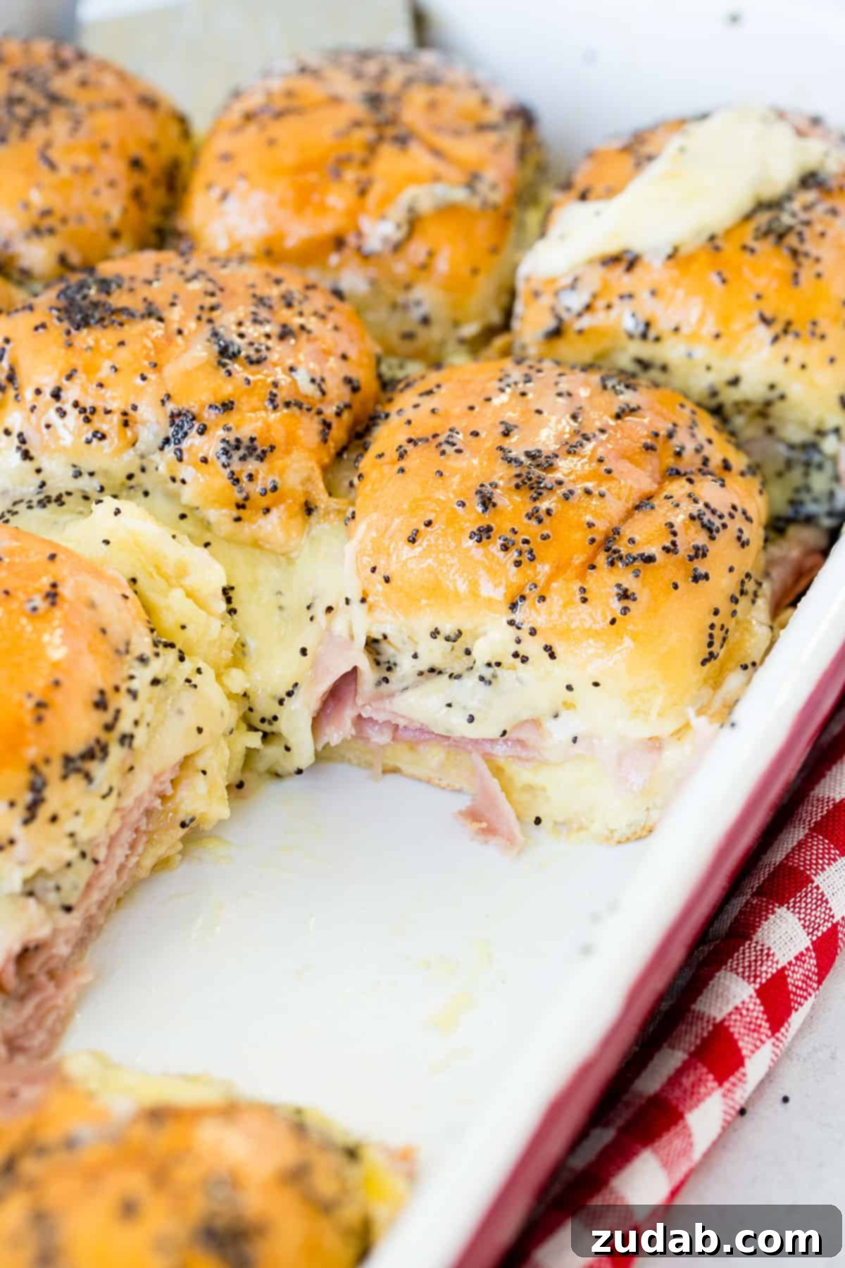 Melty Ham and Cheese Buns 7 The best recipes for leftover ham include these delightful ham and cheese sliders with poppy seed dressing.