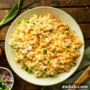 Zesty Deviled Egg Pasta Salad 9 a photo of a bowl full of creamy deviled egg pasta salad