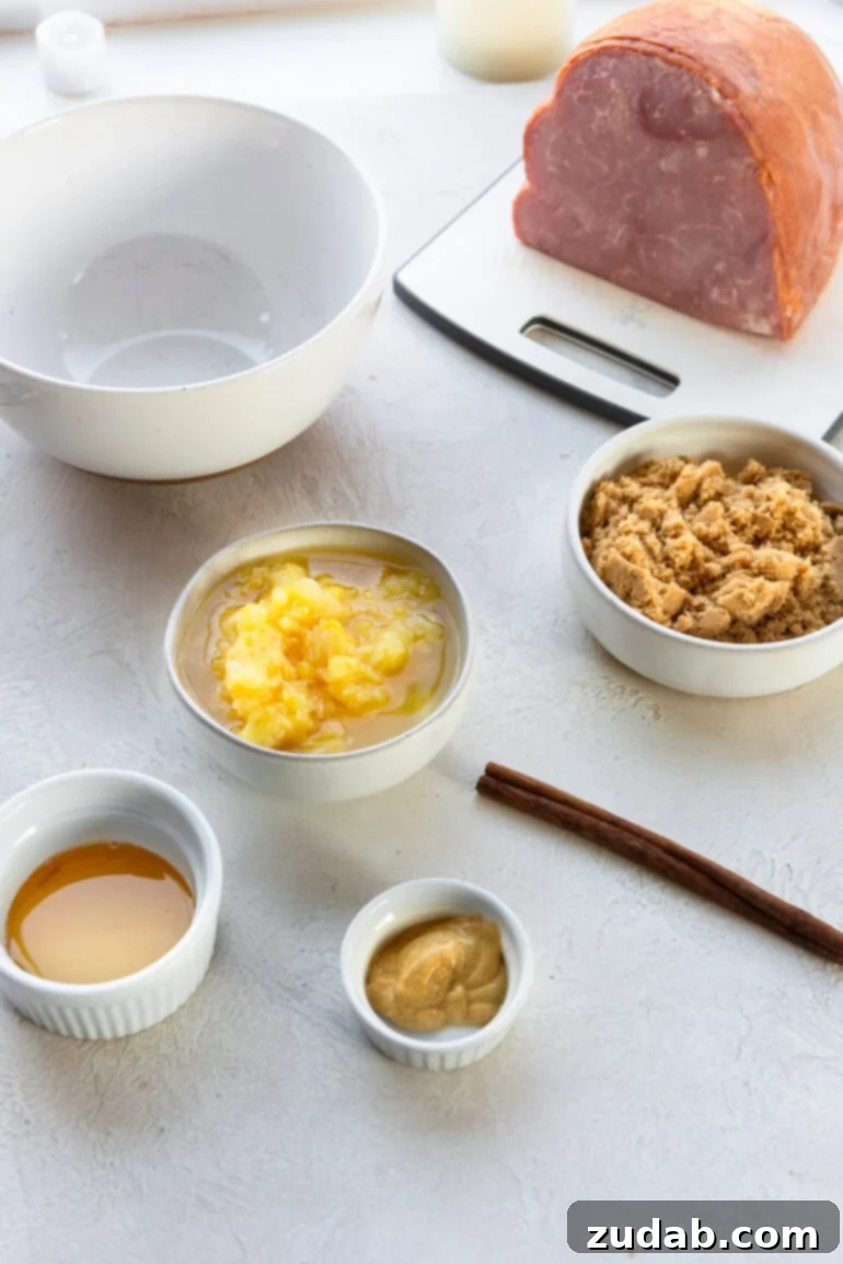 Your New Favorite Slow Cooker Ham 4 a photo of all the ingredients for slow cooker ham and its glaze in separate little bowls