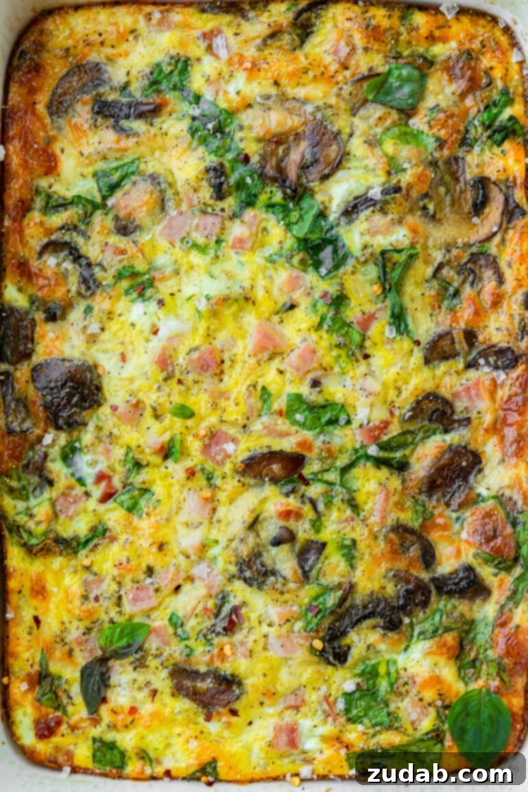 Morning Magic: Ham, Cheese, and Mushroom Egg Bake 6 A baked ham, egg, cheese, and sautéed mushroom breakfast casserole.