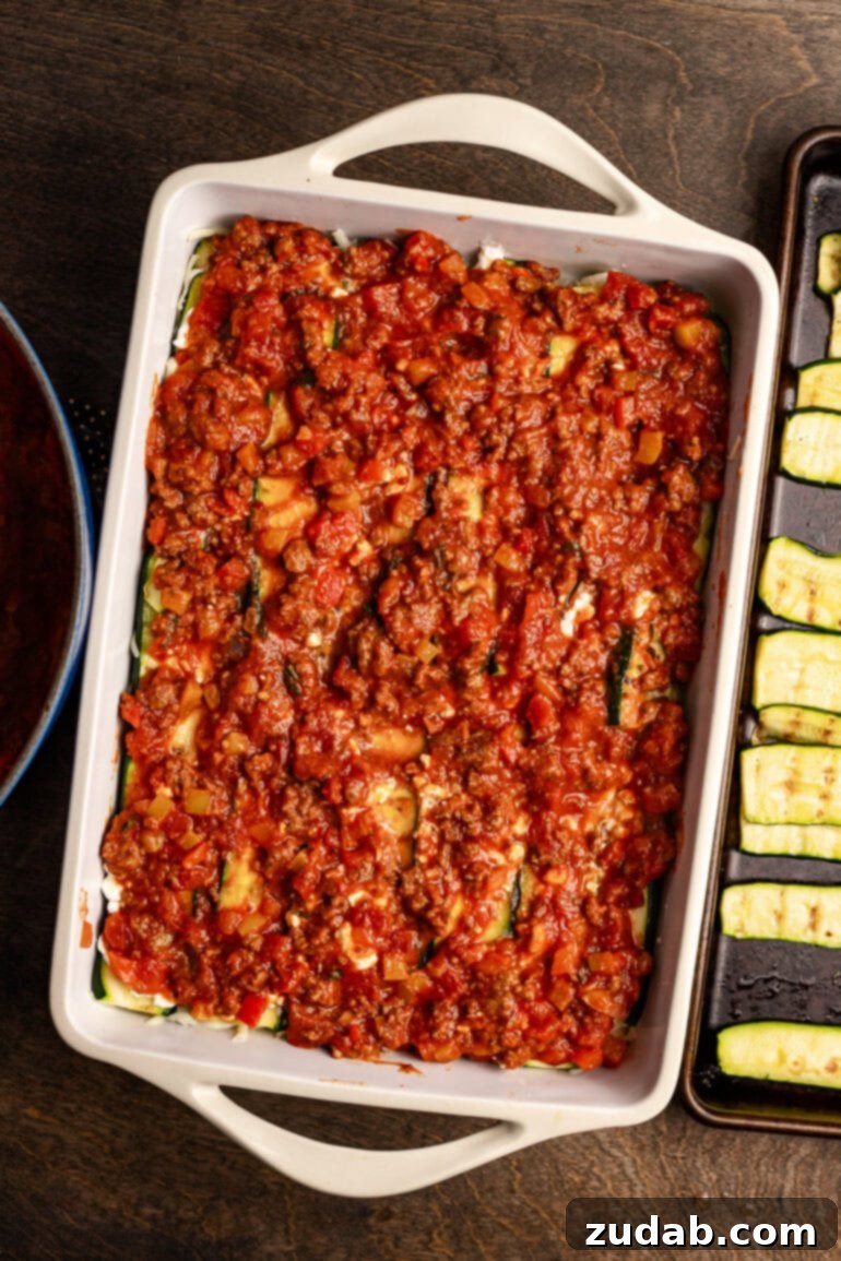 Perfect Zucchini Lasagna No Soggy Layers 13 Lasagna ready for the oven, covered with foil.