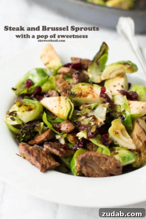 A mouth-watering view of our quick steak and Brussels sprouts recipe from ohsweetbasil.com – a healthy, simple, and satisfying dinner option. Close-up of a perfectly cooked steak alongside tender, caramelized Brussels sprouts, seasoned to perfection. This low-carb, gluten-free, grain-free meal is ready in minutes.