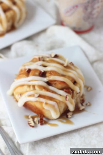 Gooey Cinnamon Roll French Toast Bake 5 Homemade Apple Pecan Cinnamon Rolls with Cream Cheese Frosting and Caramel Sauce, a decadent treat
