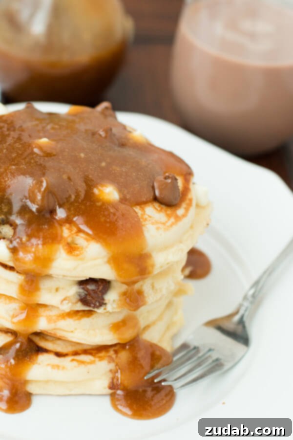 A Spoonful of Happiness: Homemade Peanut Butter Maple Syrup Freshly made Peanut Butter Maple Syrup, a rich and creamy delight, reflecting the high quality of California's dairy products, including milk, butter, and heavy cream.