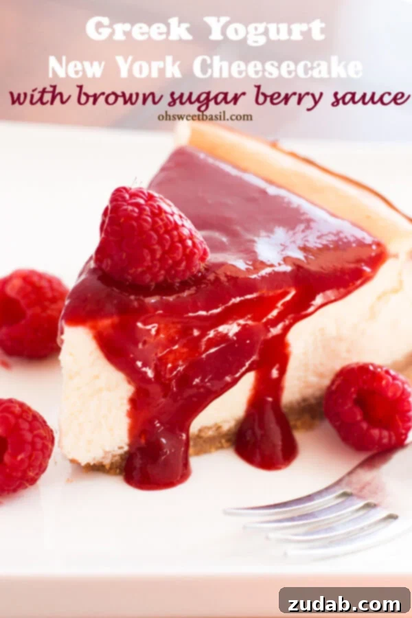 Indulge in a creamy Greek Yogurt New York Cheesecake topped with a luscious brown sugar berry sauce – a perfect blend of tang and sweetness.