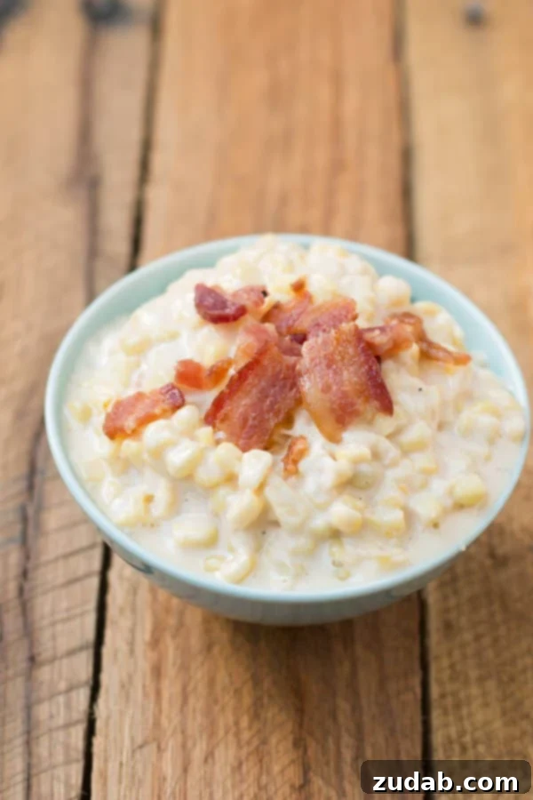 Homemade Creamed Corn with a Unique Twist | ohsweetbasil.com A close-up of the best creamed corn, showing its rich, thick texture. Like, ever. I may have licked the the bowl. ohsweetbasil.com
