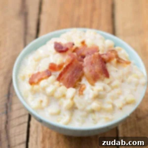 Ultimate Creamed Corn 2 A bowl of the rich, creamy corn topped with crumbled bacon.