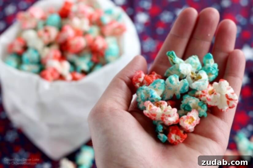 Patriotic Popcorn, 4th of July, summer food Close-up of patriotic popcorn in various bowls, showcasing the red, white, and blue colors