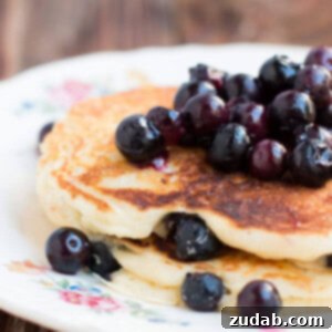 White chocolate blueberry pancakes on ohsweetbasil.com