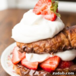 The ultimate grilled croissants with Nutella and berries, a delightful dessert.