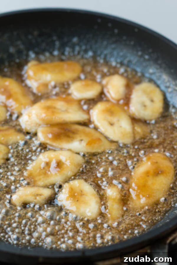 Easy and Delicious Dessert: Bananas Foster Rice Pudding for Entertaining Friends gathered around enjoying Bananas Foster Rice Pudding