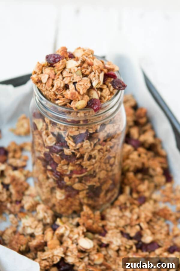 Healthy and Delicious Homemade Granola A bowl filled with wholesome strawberry almond granola, ready to be enjoyed.