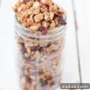 Handcrafted Strawberry Almond Granola 2 Strawberry almond homemade granola on a serving plate.