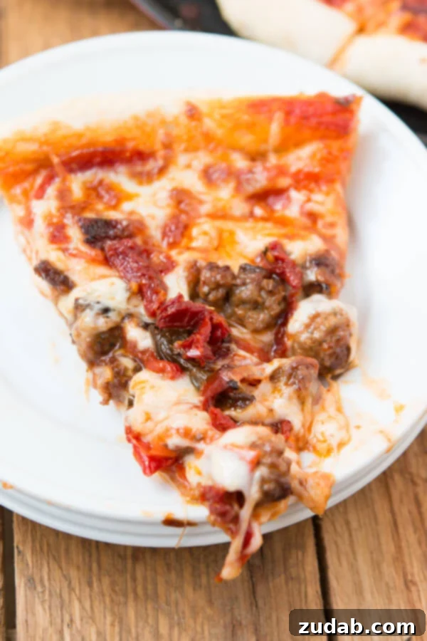 Italian Lovers Pizza: The Ultimate Homemade Pizza Experience This Little Italy Homemade Pizza recipe combines a uniquely flavorful crust, our famous homemade pizza sauce, and a topping medley of spicy Italian sausage, caramelized onions and peppers, pepperoni, mozzarella, and sun-dried tomatoes for an unforgettable family meal. ohsweetbasil.com