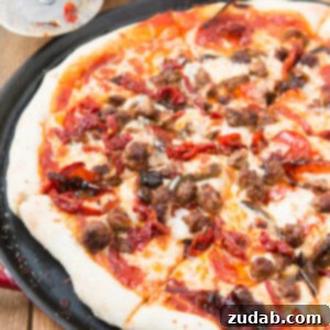 Little Italy's Hearthstone Pizza 2 Little Italy Homemade Pizza with caramelized onions, spicy sausage, and sun-dried tomatoes