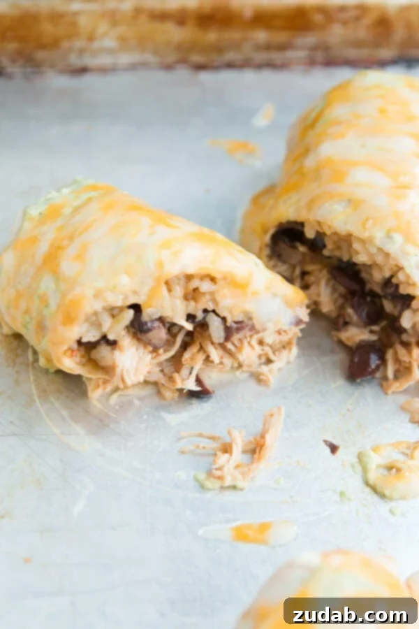 Our favorite smothered burritos cafe rio style ohsweetbasil.com Delicious Cafe Rio style smothered burritos with chicken and ranch sauce