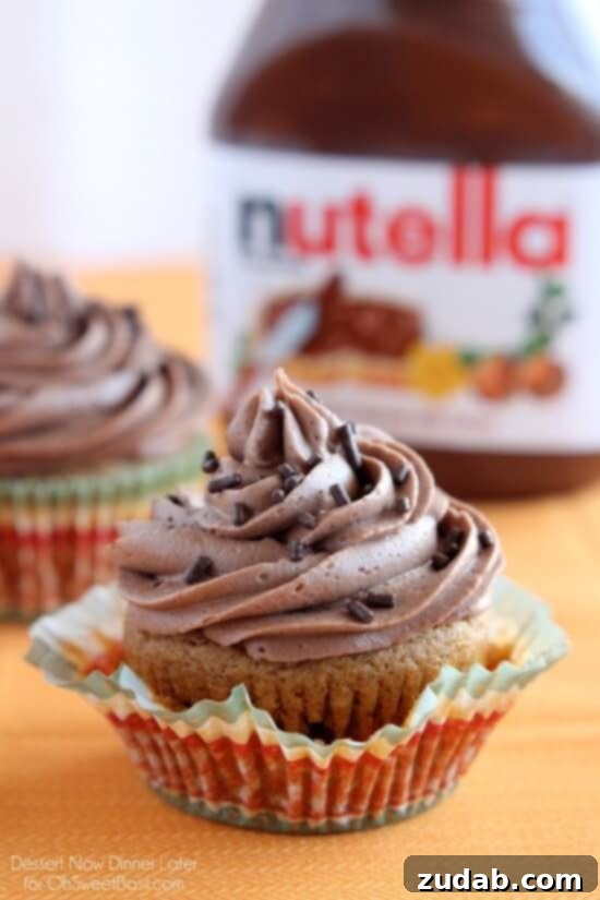 Pumpkin Cupcakes with Nutella Frosting Delicious Pumpkin Cupcakes with Creamy Nutella Frosting