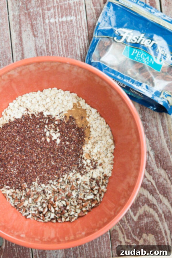 Homemade Pecan Quinoa Granola with crunchy clusters and natural sweetness. A healthy snack or breakfast topping.