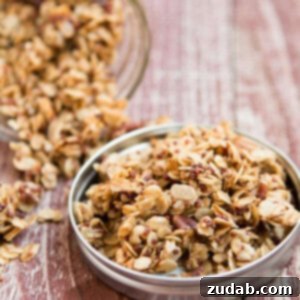 Pecan Quinoa Granola, freshly baked and ready to be broken into clusters for snacking.