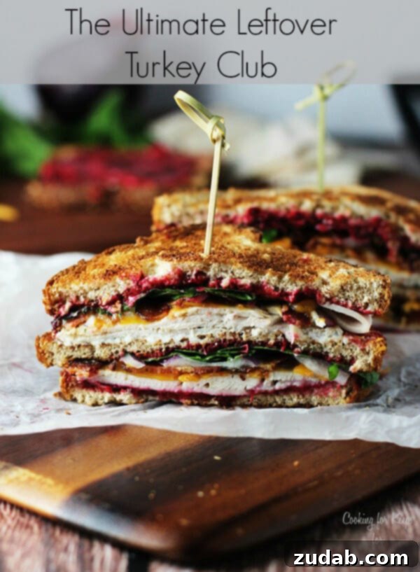 The Ultimate Thanksgiving Leftover Turkey Club The Ultimate Thanksgiving Leftover Turkey Club Sandwich with crispy bacon, cranberry mayo, and melted cheese