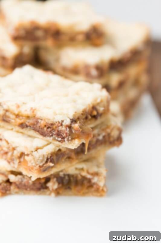 Delicious Twix caramel blondie brownies recipe from ohsweetbasil.com