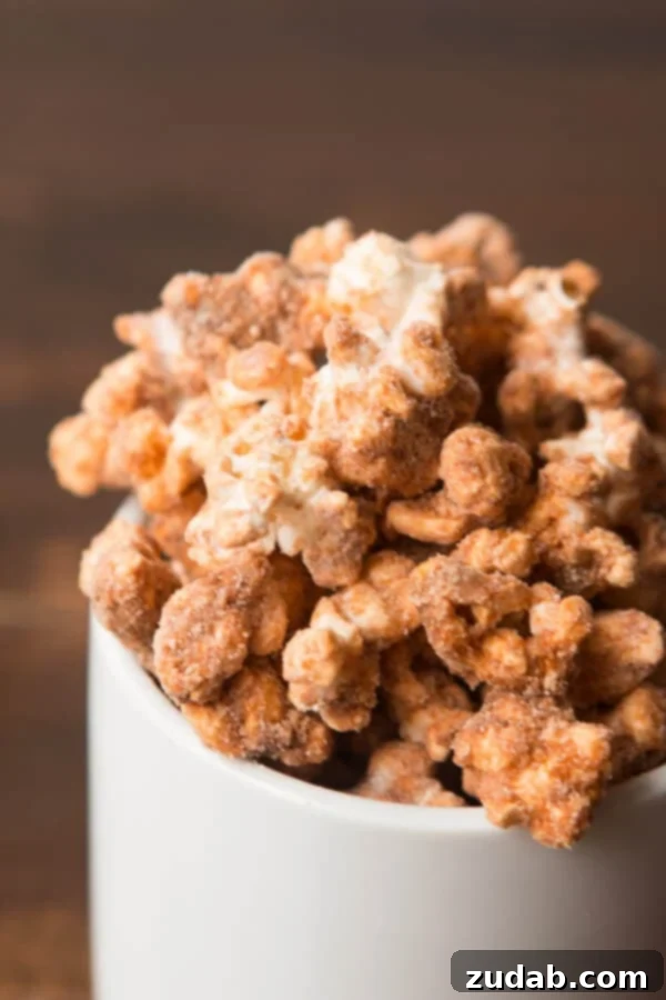 Rustic Churro Popcorn Bowl A close-up of a generous serving of churro popcorn in a rustic wooden bowl, inviting you to indulge in this sweet treat.