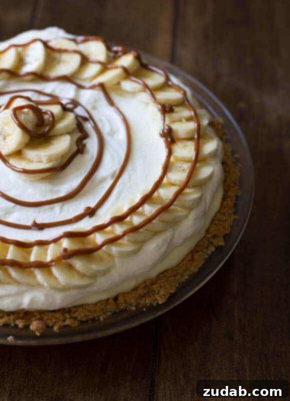 Heavenly No-Bake Banana Pudding Pie with Nilla Wafer Crust 14 A visually stunning Dulce De Leche Banana Cream Pie, emphasizing its sweet deliciousness.