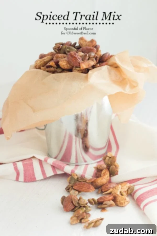 Spiced Trail Mix - a healthy serving of nuts, coconut and pepitas seasoned with spices creates a delicious snack! Spiced Trail Mix - a healthy serving of nuts, coconut and pepitas seasoned with spices creates a delicious snack!
