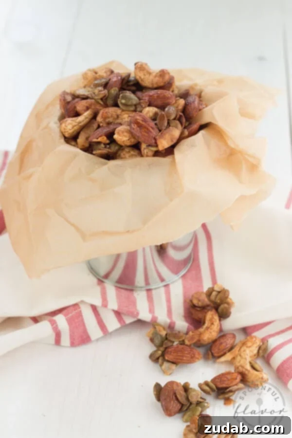 Spiced Trail Mix - a healthy serving of nuts, coconut and pepitas seasoned with spices creates a delicious snack! Spiced Trail Mix - a healthy serving of nuts, coconut and pepitas seasoned with spices creates a delicious snack!