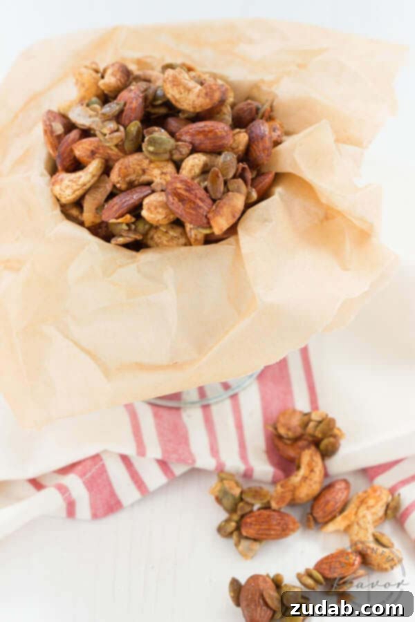 Spiced Trail Mix - a healthy serving of nuts, coconut and pepitas seasoned with spices creates a delicious snack! Spiced Trail Mix - a healthy serving of nuts, coconut and pepitas seasoned with spices creates a delicious snack!