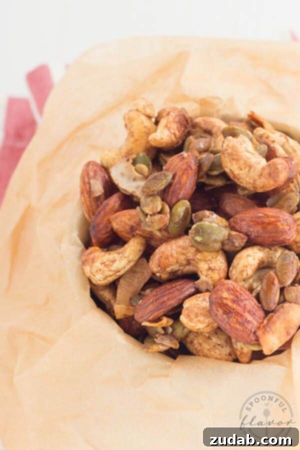 Spiced Trail Mix - a healthy serving of nuts, coconut and pepitas seasoned with spices creates a delicious snack! Spiced Trail Mix - a healthy serving of nuts, coconut and pepitas seasoned with spices creates a delicious snack!