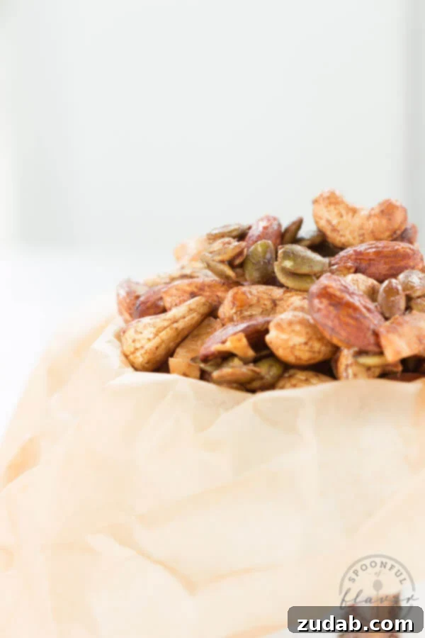 Spiced Trail Mix - a healthy serving of nuts, coconut and pepitas seasoned with spices creates a delicious snack! Spiced Trail Mix - a healthy serving of nuts, coconut and pepitas seasoned with spices creates a delicious snack!