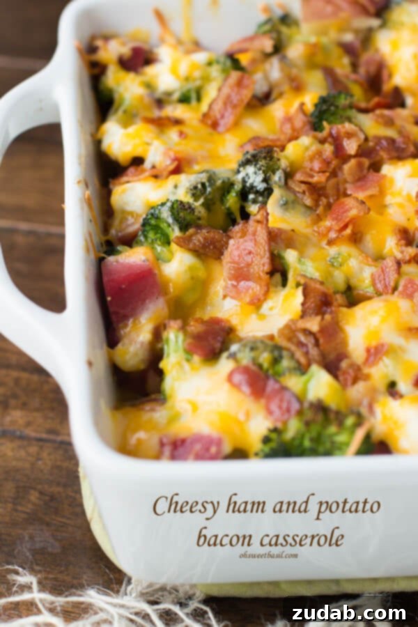 Cheesy Ham and Potato Bacon Casserole - A hearty, comforting casserole perfect for using holiday leftovers or a weekend brunch.