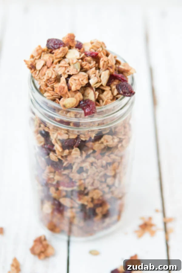 Homemade Strawberry Almond Granola, a delicious and crunchy breakfast option. strawberry almond homemade granola. In fact, our best recipe ever. ohsweetbasil.com
