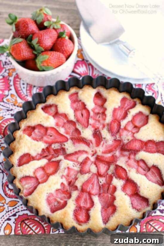 Fresh Strawberries Layered on Cake Batter Strawberry Cake Batter with Sliced Strawberries Ready for Baking