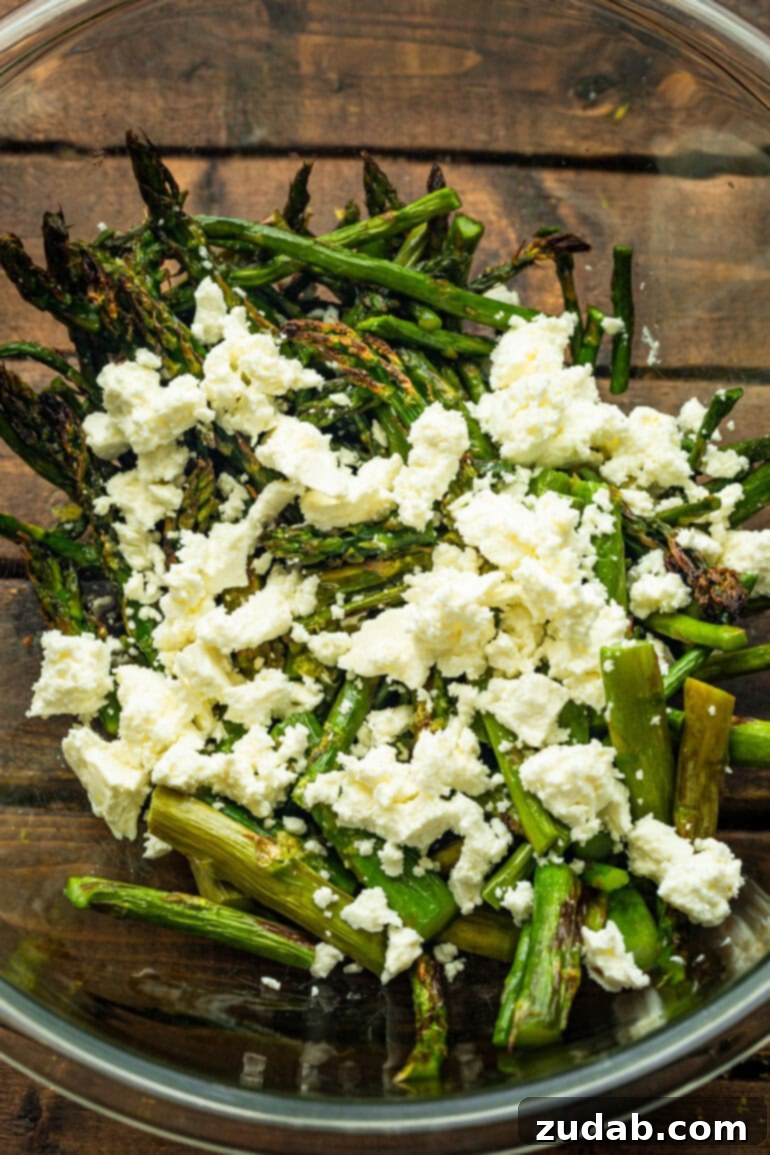 a phot of the steps for making grilled asparagus including asparagus spears sitting on a wooden cutting board and another photo of grilled asparagus sprinkled with feta cheese