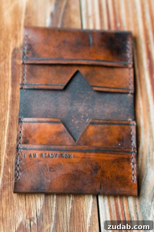 Handmade Leather Wallet: The Ideal Personalized Gift for Him The ultimate personalized gift: a custom engraved leather wallet from Red Leaf Leather, featuring a meaningful message on the inside.