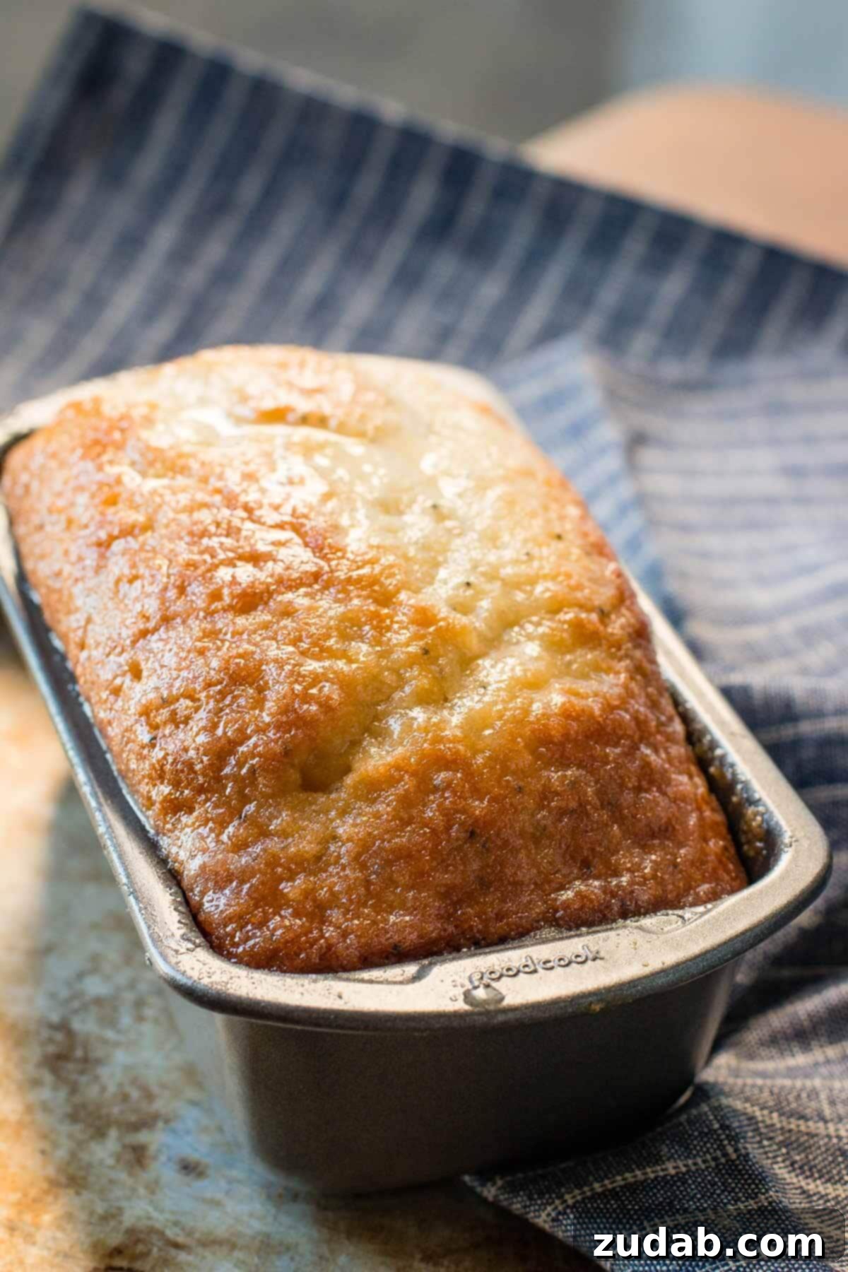There's not much I love more than a glazed poppy seed bread. It's an easy quick bread recipe that the whole family will love for a holiday breakfast idea.