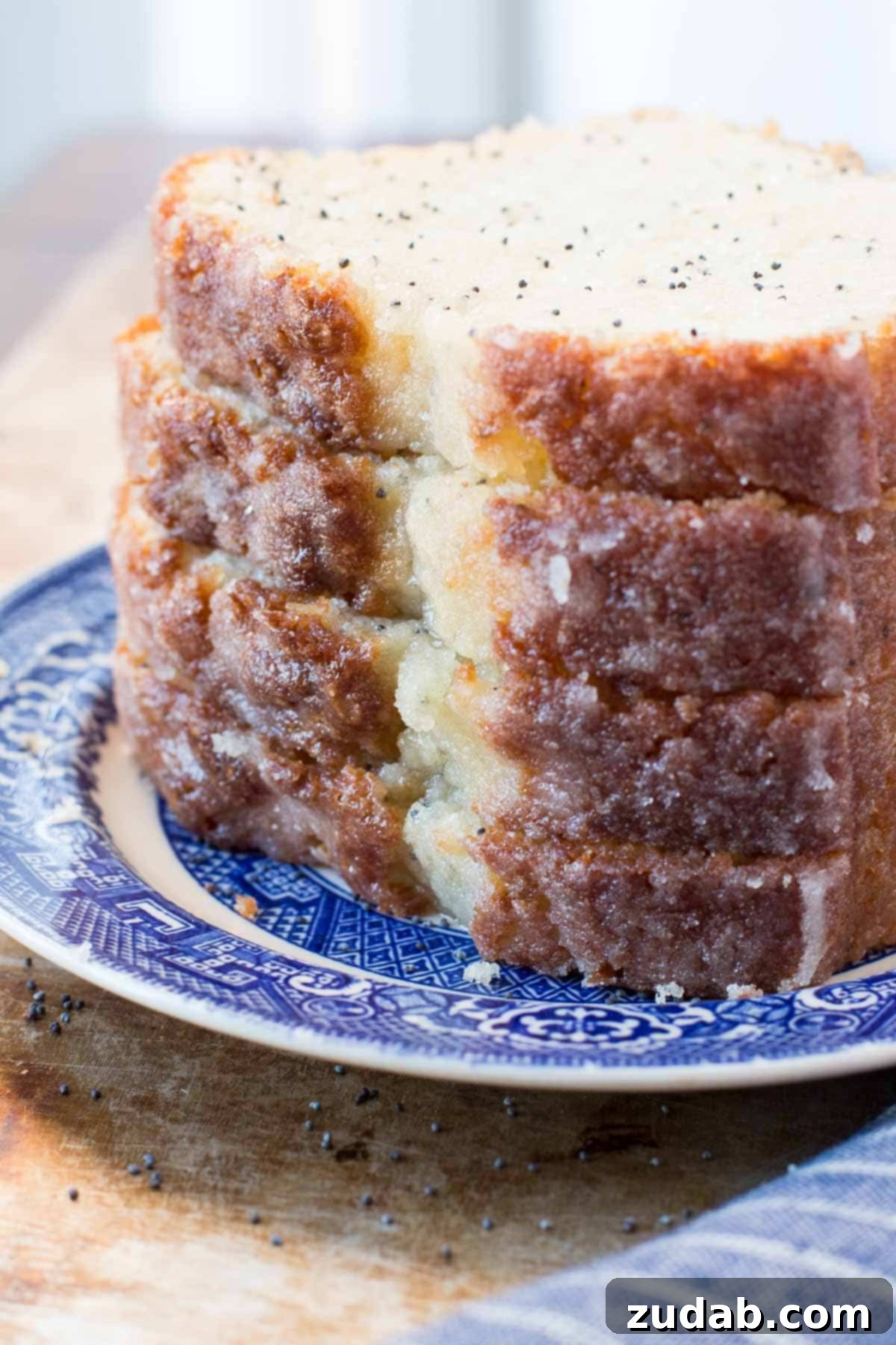 There's not much I love more than a glazed poppy seed bread. It's an easy quick bread recipe that the whole family will love for a holiday breakfast idea.