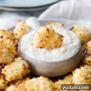 Golden Baked Coconut Shrimp with a Bright Tropical Dipping Sauce 2 Baked Coconut Shrimp with Tropical Dipping Sauce is a healthy summer dinner.