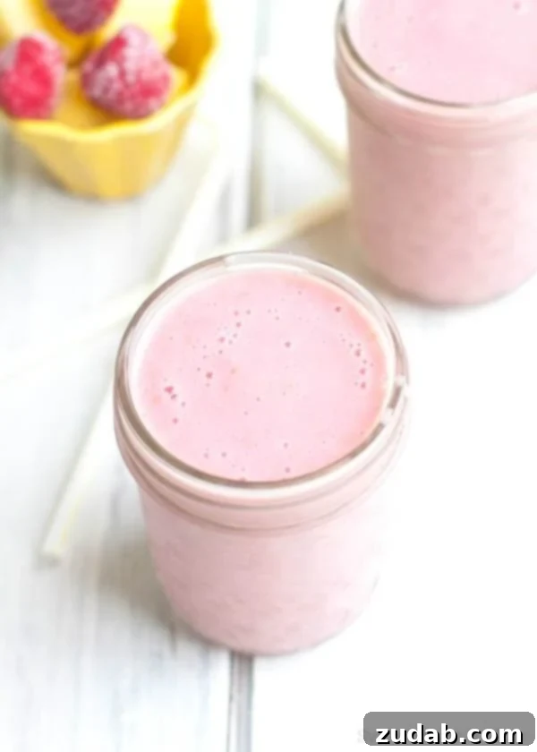 Green Peach Berry Protein Chia Bowl 5 Refreshing Raspberry Pineapple Coconut Smoothie - a tropical twist for a healthy start.