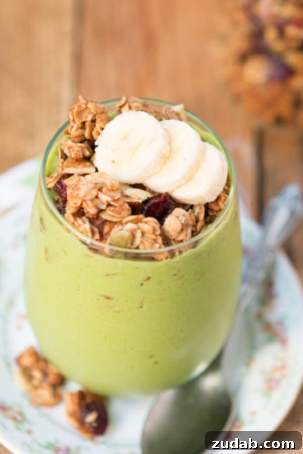 Green Peach Berry Protein Chia Bowl 6 Nutrient-dense Protein Green Smoothie Granola Parfait - layers of goodness for sustained energy.