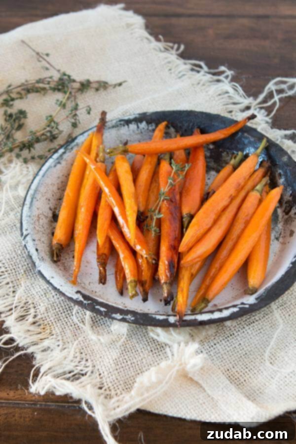 Our family's favorite side, honey roasted carrots. ohsweetbasil.com Our family's favorite side, honey roasted carrots, are a simple yet elegant addition to any dinner. ohsweetbasil.com