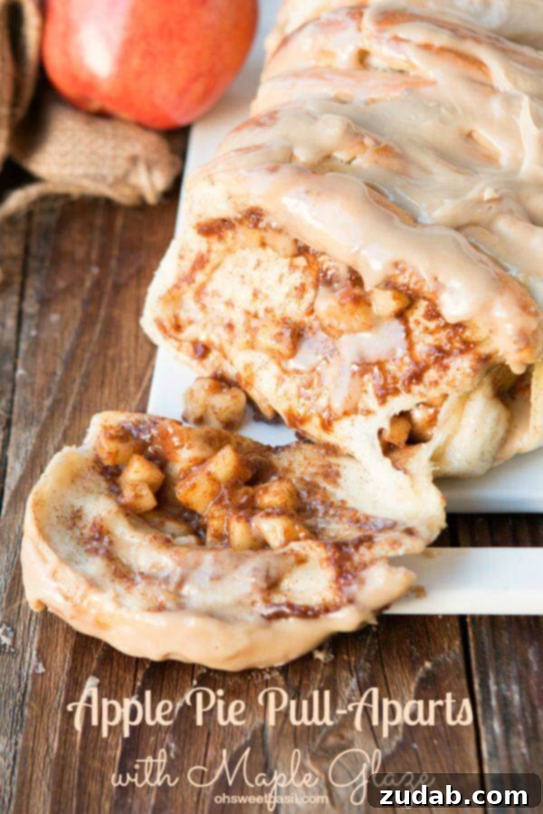 This is our new breakfast tradition, apple pie pull apart bread with maple glaze and it only takes frozen roll dough to get started! This is our new breakfast tradition, apple pie pull apart bread with maple glaze and it only takes frozen roll dough to get started!