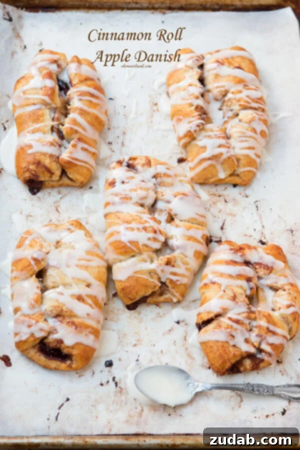Spiced Apple Pull Apart Bread with Sweet Maple Glaze 6 These are amazing! Cinnamon Roll Apple Danishes that are ready in 15 minutes! ohsweetbasil.com