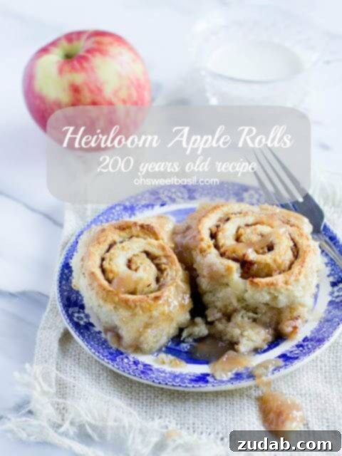 Spiced Apple Pull Apart Bread with Sweet Maple Glaze 7 Heirloom Apple Rolls from over 200 years ago. Tender cinnamony rolls loaded with apples and baked in a sweet syrup. Serve with warm cream or milk and enjoy ohsweetbasil.com