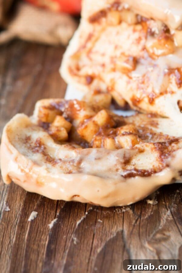 This is our new breakfast tradition, apple pie pull apart bread with maple glaze and it only takes frozen roll dough to get started! This is our new breakfast tradition, apple pie pull apart bread with maple glaze and it only takes frozen roll dough to get started!
